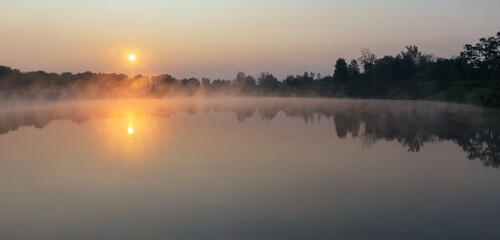 foggy sunrise over the river