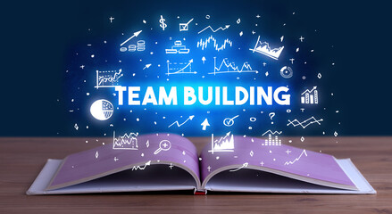 TEAM BUILDING inscription coming out from an open book, business concept