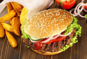 Big Size Hamburger - Fast Food on wooden Background