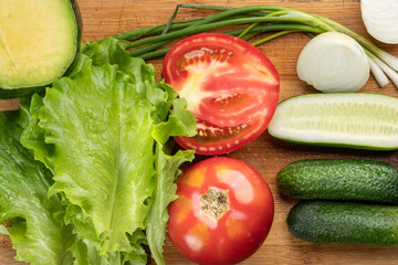 Healthy food. Flatlay lay view of fresh sliced vegetables on cutting board