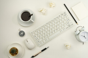 Office desk table of Business workplace and business objects on white leather background.