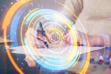 Technology theme hologram over woman's hands taking notes background. Concept of Tech. Double exposure