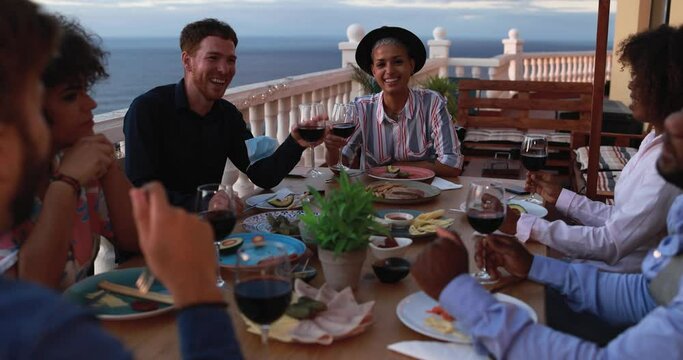 Young people having dinner at home - Slow Motion
