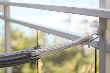 Hammock set up on balcony of apartment block in the Whitsundays, Queensland, Australia
