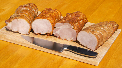 Smoked pork ham. Cold cuts on wooden board
