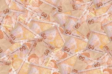 50 Turkish liras bills lies in big pile. Rich life conceptual background