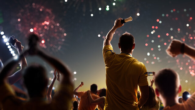 Fans celebrate in Stadium Arena night fireworks
