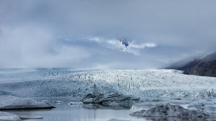 Ice glacier with mountains on Iceland