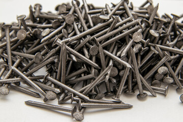 Metal construction nail for roofing. Fasteners product.