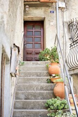 Fototapeta na wymiar ancient house entrance in corte corsica france