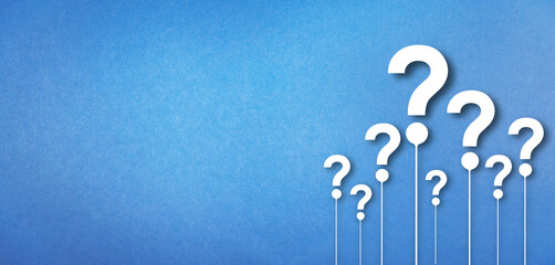 question mark on blue background, quiz question mark concept