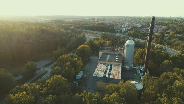 Aerial View, Power Plant with Highway Traffic in Background, Autumn, Renewable Energy