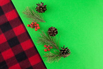 Christmas and new year background. Decorations on a green and checkered background