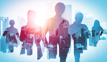 Abstract image of many business people together in group on background of city view with office...