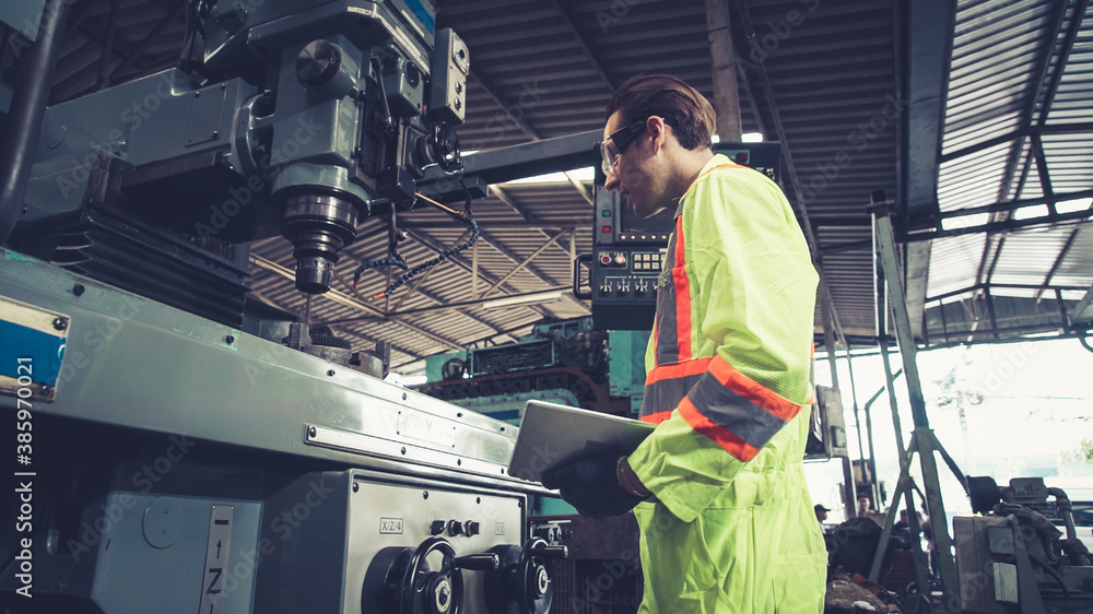 Poster smart factory worker using machine in factory workshop . industry and engineering concept.