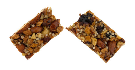 Apple and spice protein bar broken in half isolated on a white background.