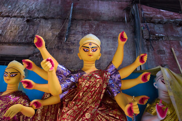 Partially completed idol of Hindu Goddess Durga with use of selective focus