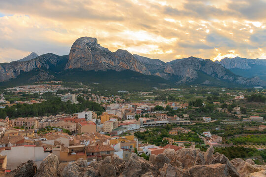 Monte Ponoig mountain near Polop, Costa Blanca, Spain. Old House Facades. Beautiful sunset. Horizontal.