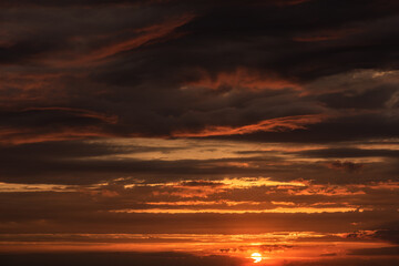 Red colored sunset with clouds