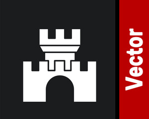 White Castle icon isolated on black background. Medieval fortress with a tower. Protection from enemies. Reliability and defense of the city. Vector.