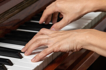 Fototapeta na wymiar hands of a piano player