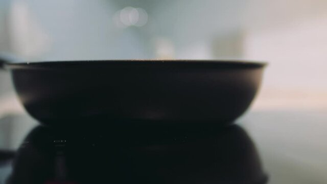 Close up of a preheating the pan