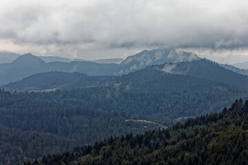 Pieniny Mountains with highest peak Trzy Korony (Three Crowns) in clouds. Nature mountain landscape.