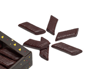 Top view of chocolate sweets filled with biscuit crumbs and condensed milk and cocoa isolated on white background