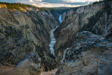 lower falls of the yellowstone national park from artist point at sunset, wyoming, usa