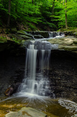 Fototapeta na wymiar Long Exposure Photograph of Blue Hen Falls Taken in the Summer in the Cuyahoga Valley National Park
