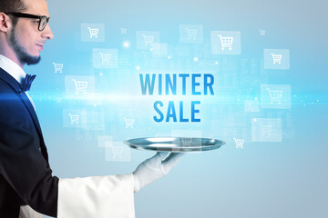 Waiter serving WINTER SALE inscription, online shopping concept