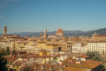 Cathedral Santa Maria del Fiore and PALAZZO VECCHIO TOWER and national Library building close to river Arno : medieval architecture of florence