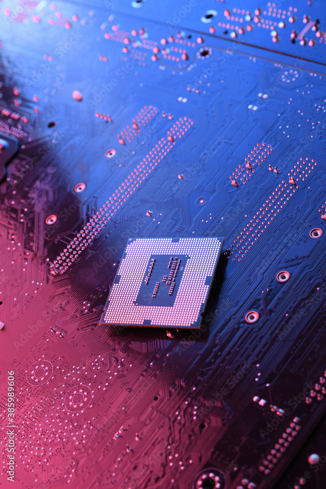 Poster computer cpu processor chip on circuit board ,motherboard background. close-up. with red-blue lighti