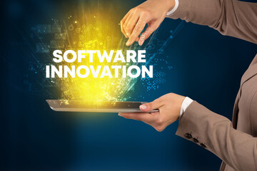 Close-up of a touchscreen with SOFTWARE INNOVATION inscription, innovative technology concept
