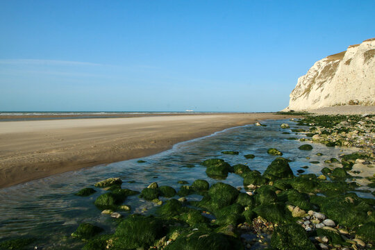 The beaches under the high white  cliffs on the shore of the Channel at Escalles in France 