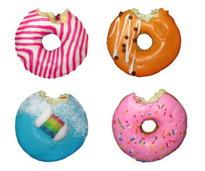 There are four bitten donuts. White background. Isolated.