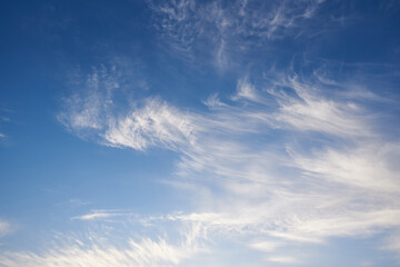 Obraz premium Flying white clouds and blue sky.