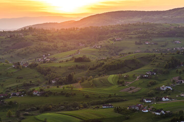 Fototapeta premium Evening in the countryside area and fields of local peasants