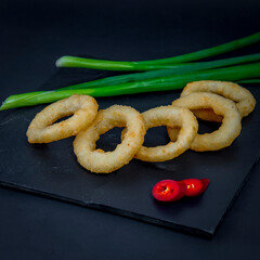 Fried onion rings in batter