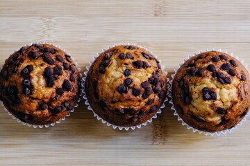 Three chocolate cupcakes.