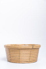 Basket wicker on isolated white background.