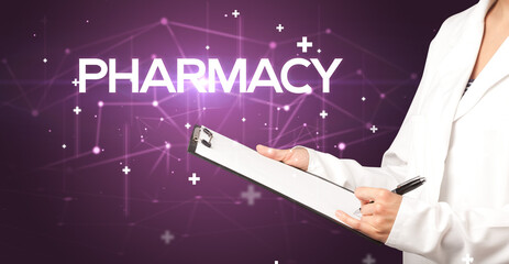 Doctor fills out medical record with PHARMACY inscription, medical concept