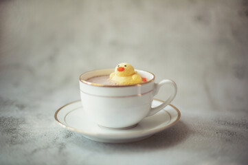 marshmallow like a duck in the cup with hot cocoa and near cup