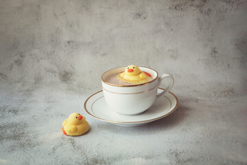 marshmallow like a duck in the cup with hot cocoa and near cup