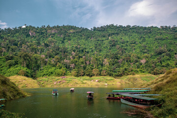 Passenger boats for tourism are parked in the river