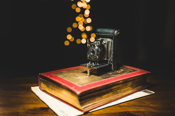 vintage camera on a old book