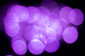 Purple bokeh on black background