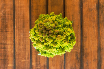 organic heirloom broccoli wood background