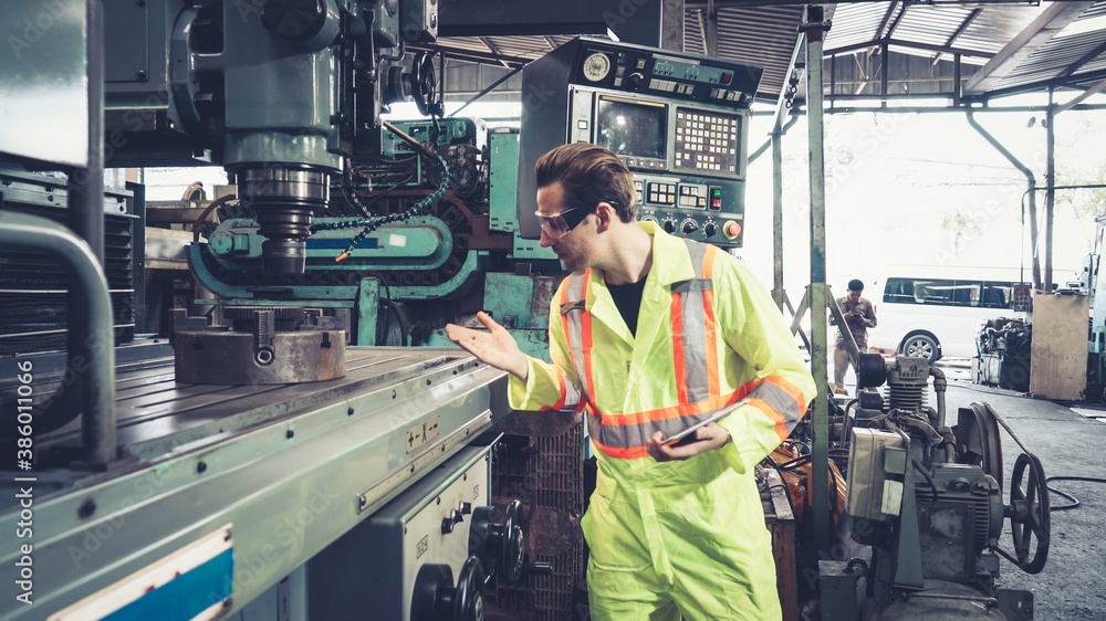 Poster smart factory worker using machine in factory workshop . industry and engineering concept.