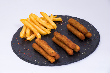 hot chicken sticks with fries